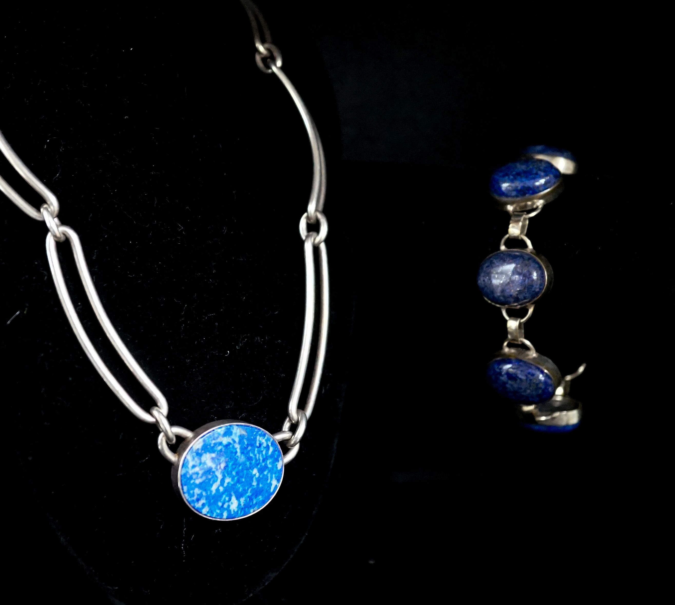 A 1980's Danish sterling 925 and lapis lazuli set necklace by N.E. From, 38cm and a white metal and lapis lazuli set bracelet.